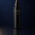 SOMNS Bedtime Pillow Mist 50 ml: a matte black bottle with a black fine-mist pump and fine cream lettering, on a dark navy background